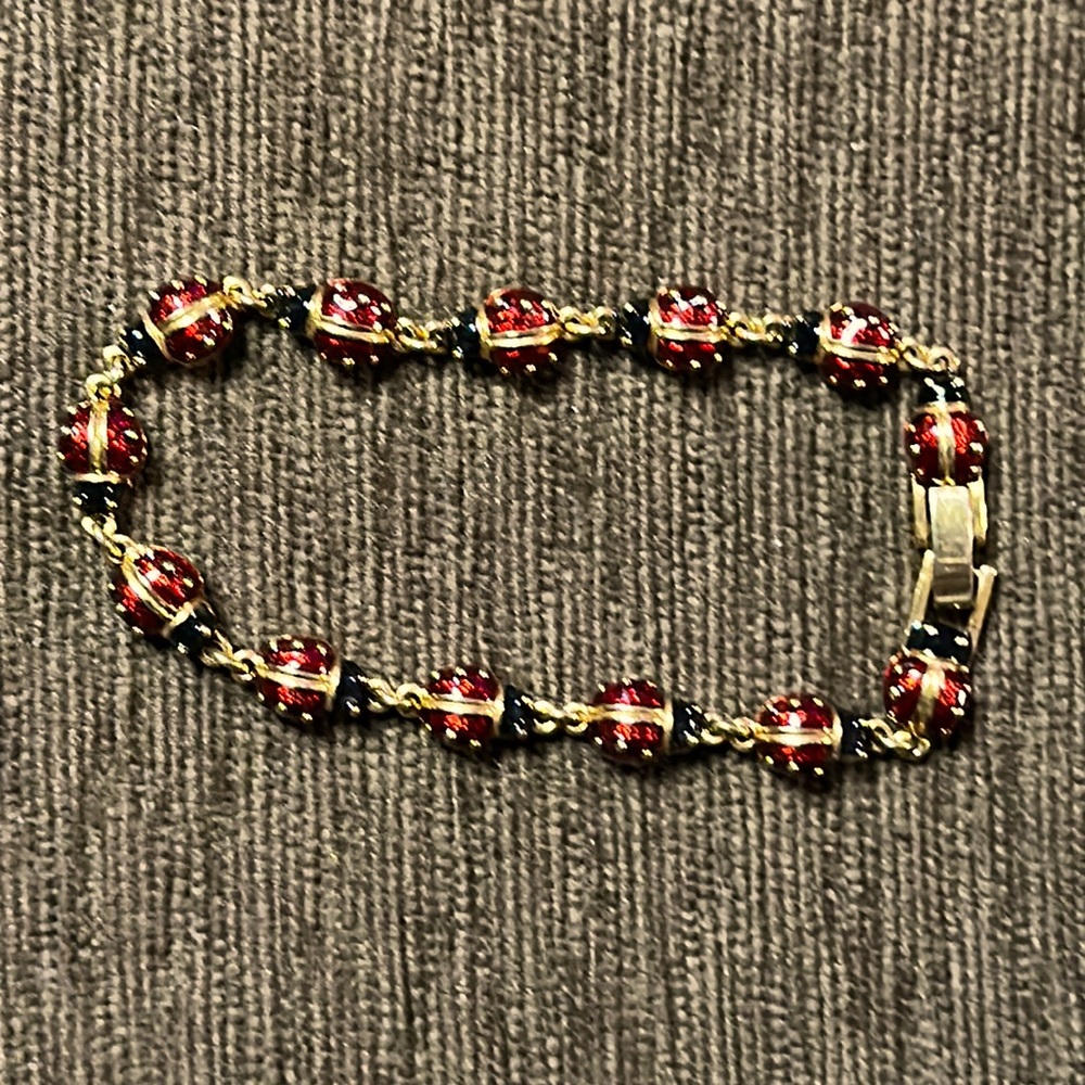 Premier Designs Signed Gold tone Ladybug Brooch with black and red enamel